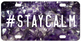 Cluster of Amethyst Crystals as the background of this custom license plate. We have hashtag stay calm for the sample but you can personalize with any text