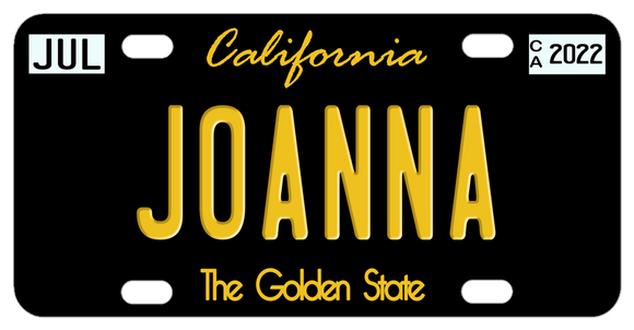 black california license plates with script font for California plate is printed flat