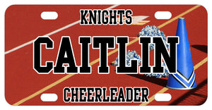 personalized cheer license plate. Megaphone and PomPoms on the track portion of the football field. printed with any name and custom text
