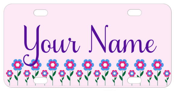 Cute daisies along the bottom of the license plate with your name in center. Add text on top if you want too.