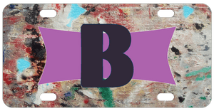 Grungy looking background with any name or initials on a purple ribbon frame personalized license plate 