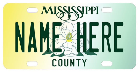 Large Magnolia in the center of soft yellow and green background Mississippi plate with any name