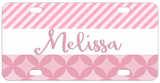 Pink Stripes on top and circled diamonds on bottom with white border in center with a name make this custom bike license plate so pretty in pink