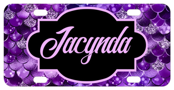 Purple mermaid scales or waves design with black frame in center with your name on bike license plate
