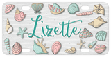 Pretty Cartoon Sea Shells in soft pinks, mauves and tan colors all around the border of the plate with any name or text in center.