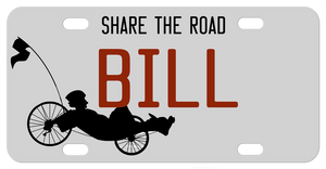 Recumbent Bike on bottom left of plain background license plate with your personalized text on top, center and bottom. 