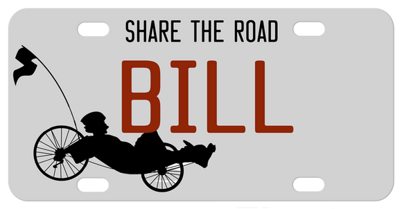 Recumbent Bike on bottom left of plain background license plate with your personalized text on top, center and bottom. 