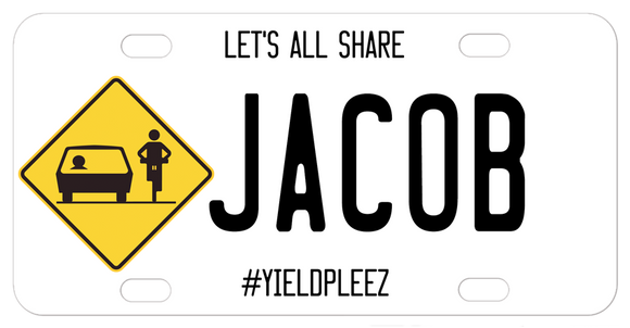 Diamond Yield Sign with Car and Cyclist sharing the road.