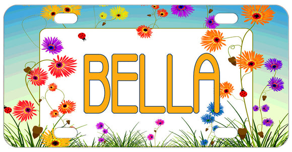 Pretty spring garden wild flowers surround your personalized name or monogrammed initials on a custom mini license plate