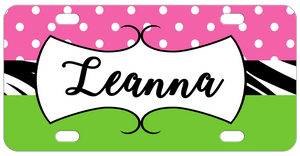 Personalized license plate with pink polka dots on top zebra band in the center and lime green bottom. Any name in a white frame in the center